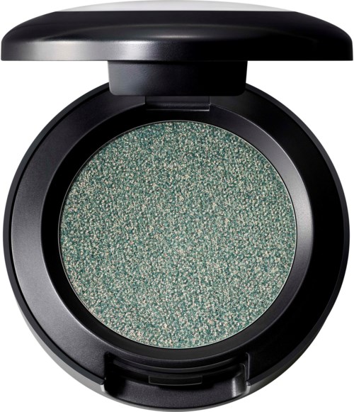 Een ronde make-up oogschaduw met zwarte kast en een groene, glanzende oppervlakte binnenin.