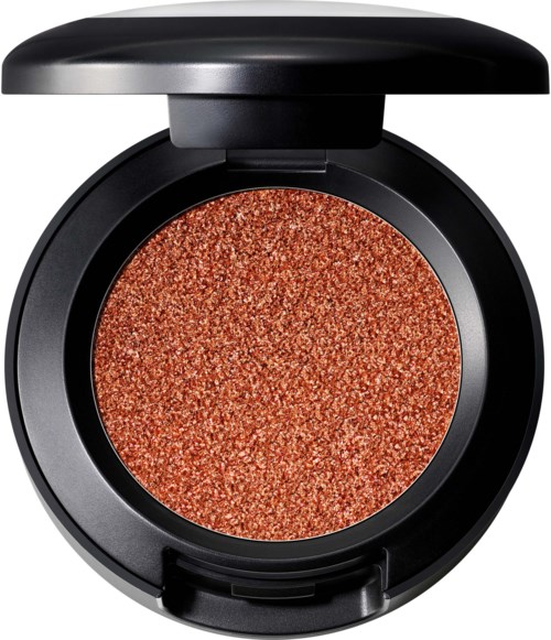 Dette er en liten rund sminke blush med glitteraktig kobberfarge og svart etui.