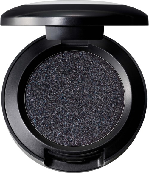 En svart rund sminkeeske med glitterøyenskygge inni.