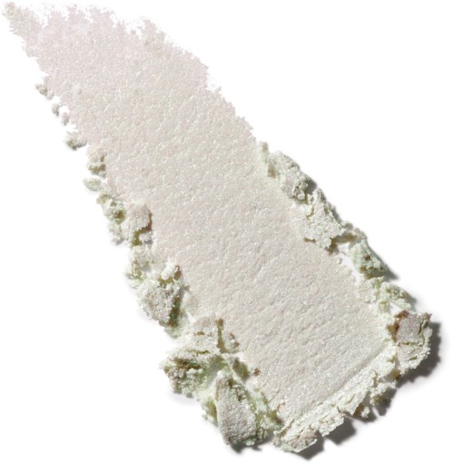 Een grote, onregelmatige witte poederachtige stof met ruwe randen op een witte achtergrond.