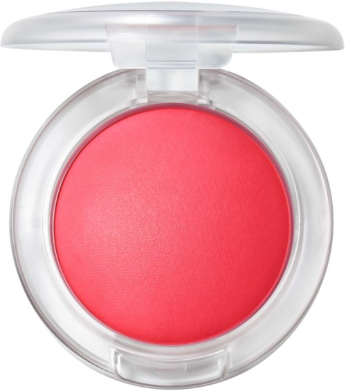 A round blush container with pink powder inside and a clear lid on top.