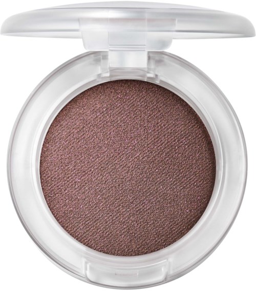 Close-up of a round eyeshadow with a shimmery brown color in a white container.