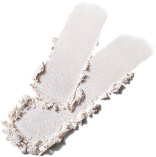 A white powdery substance with two rectangular makeup sponge pieces, some crushed powder around them.