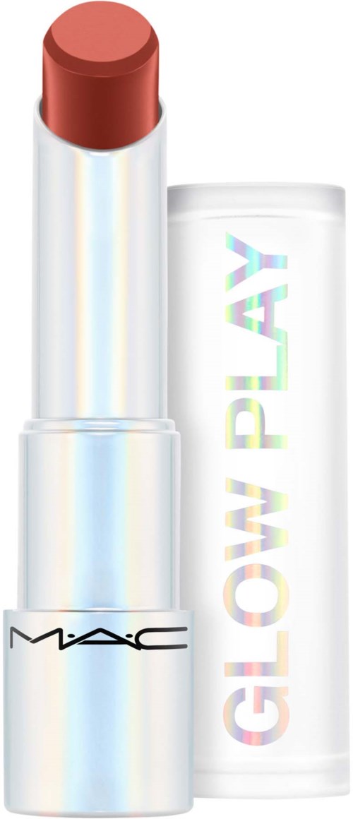 Pomadka z błyszczącą białą oprawą i ciepłym brązowym odcieniem. Opakowanie jest proste, z napisem "GLOW PLAY".
