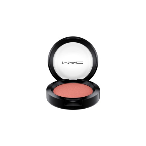 A round black makeup compact with a mirror, open to show pink blush inside.