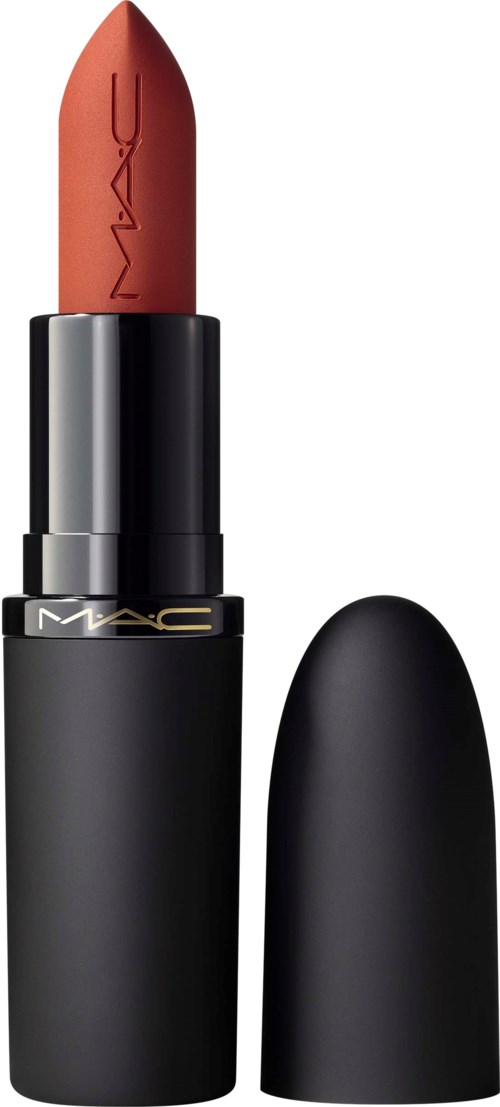 Een lippenstift met zwart doosje en verwijderde deksel, die een perzikkleurige lippenstift toont.