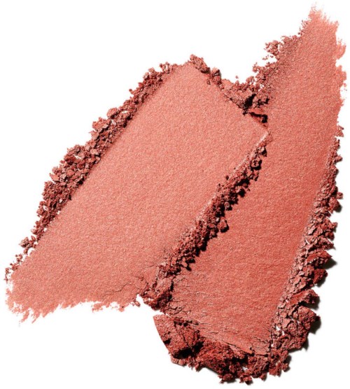 To stykker af ferskenfarvet knust makeup eller blush med ru kanter og en blød, skimrende tekstur.