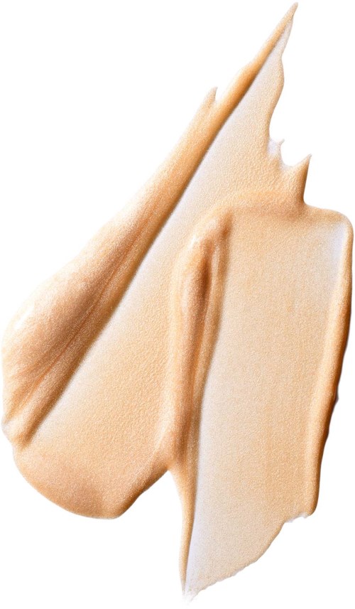 Cremeagtig beige spredning med en glat tekstur, sandsynligvis et kosmetik- eller madprodukt, delvist på hvid baggrund.
