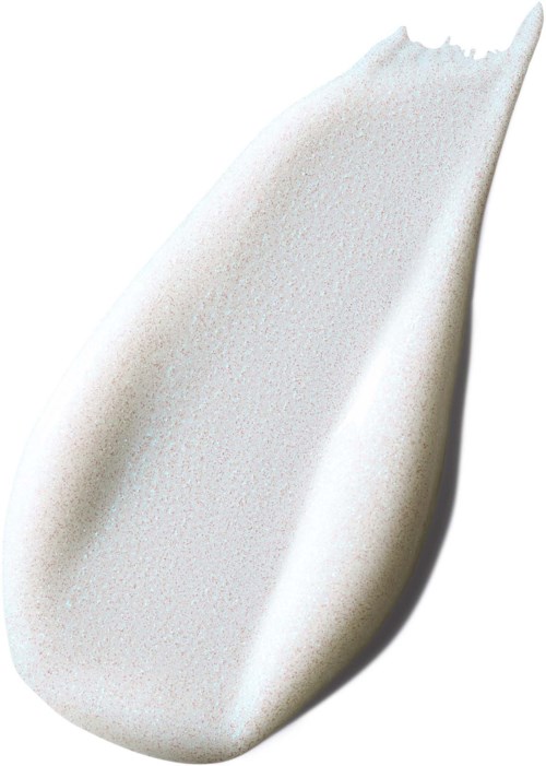 Ein weißes Muschel mit glatter, gebogener Oberfläche und spitzer Spitze, im Schatten auf weißem Hintergrund.