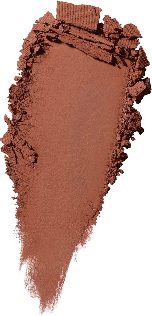 Brunlig makeup eller ansigtspudder smuldret med en ujævn kant og fine partikler spreder sig udad.