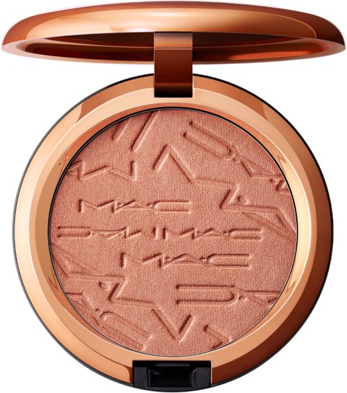 A round blush compact with a rose gold case and embossed text on the blush surface.