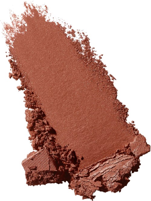 A piece of pressed, reddish-brown powder, likely makeup or pigment, with rough edges and some crushed areas.