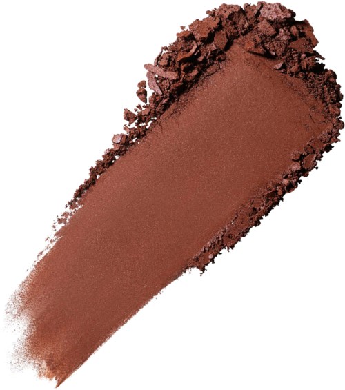 A brown powder spread in a line with some crushed pieces at the top.
