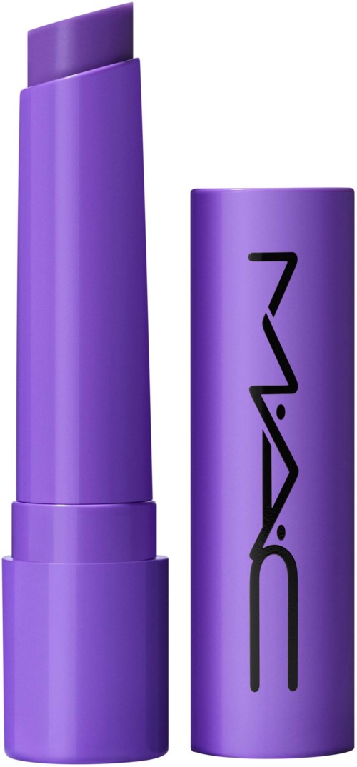 A purple makeup stick with its cap off, showing the product inside, and the letters 'MAC' on the cap.