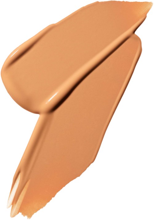 Een beige vloeibare foundation-smeer met een lichte glans, met een gladde textuur en gebogen streken.