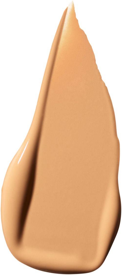 Een beige, langgerekte vlek van vloeistof of crème met een puntige top.