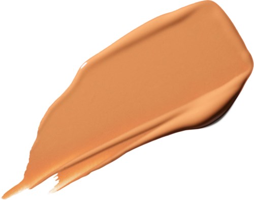 Een vlekje beige vloeibare make-up of foundation op een witte achtergrond.