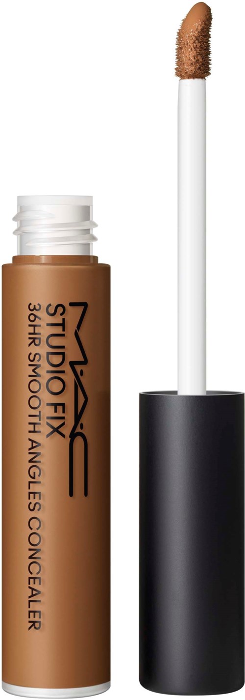Een beige concealerstick met een zwarte dop en een witte applicator.