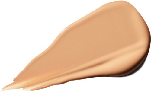 Een beige romige vloeistof in een druppelvorm met een glad oppervlak en afgeronde randen.