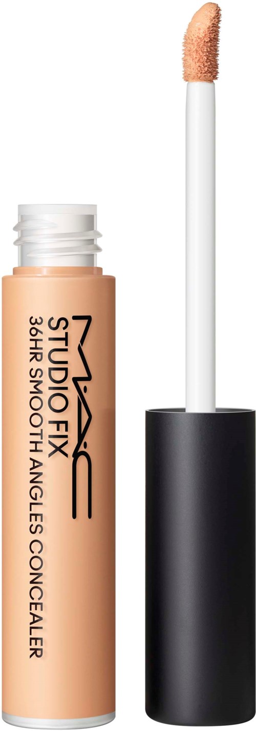 Een concealer tube in huidskleur met een kwastapplicator, zwarte dop en witte handvaten.