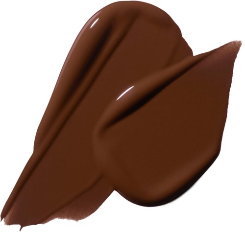 Een dikke streep gesmolten chocolade met een gladde, glanzende uitstraling en een lichte boog.
