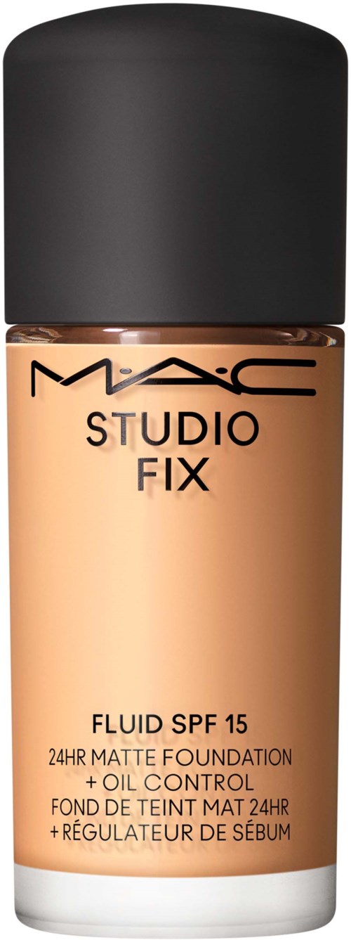 Eine Flasche MAC Studio Fix Foundation mit SPF 15, schwarzer Deckel und beigefarbene Flüssigkeit.