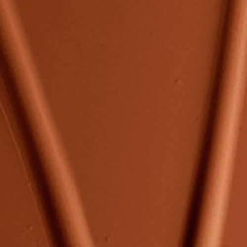 Two brown rods are attached to a brown surface, possibly a wall or ceiling.
