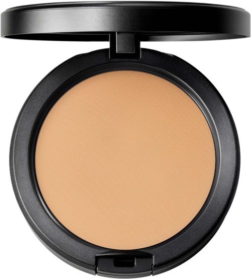 A round compact with beige powder, black lid open, used for makeup.