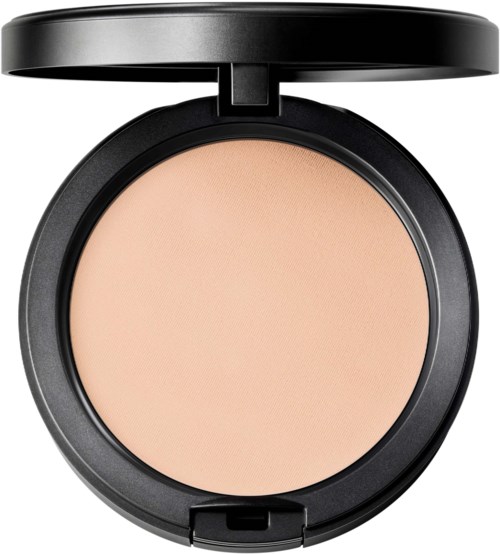 A round compact with beige pressed powder and a black lid, open to show the product inside.