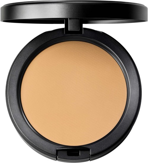 A compact with beige pressed powder, open lid, black circular case, used for makeup or face powder.