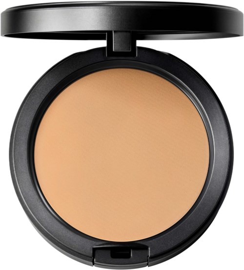 A compact powder case with a beige powder inside and a black lid.