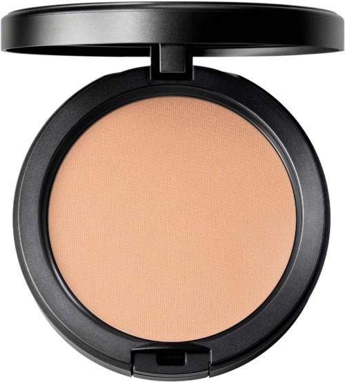 A round compact with beige powder and a black lid, opened to show makeup inside.