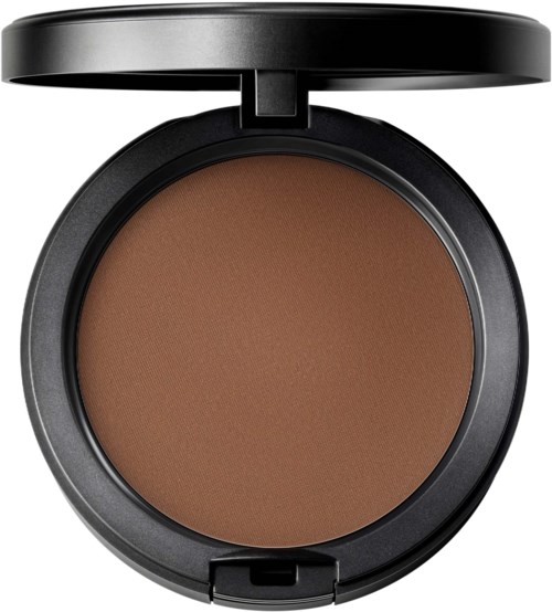 A round makeup compact with a black lid, containing light brown powder for face or cheek use.