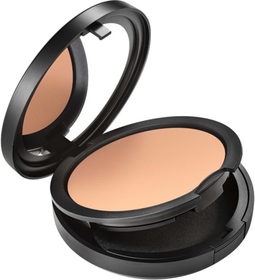 A compact makeup powder case with a mirror inside, containing pressed powder for face. Simple and portable.