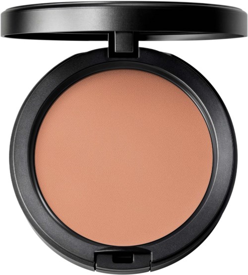 A black compact case with a lid, containing peach-colored powder or blush.