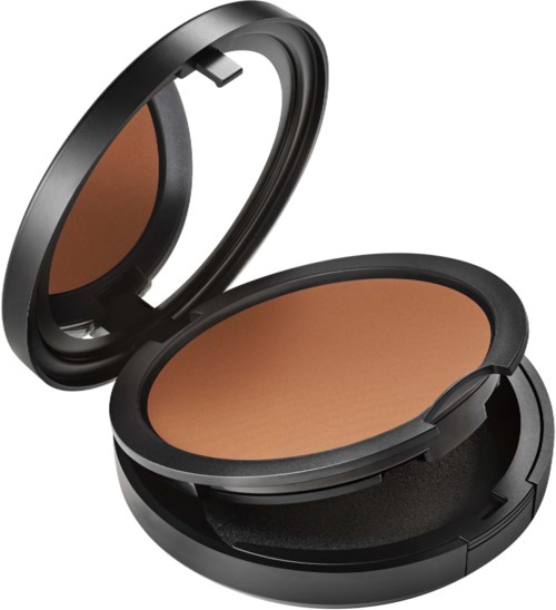 A compact makeup powder with a mirror, in a black case, showing tan-colored powder inside.