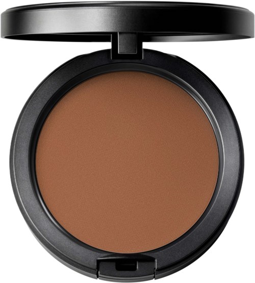 A round makeup compact with brown powder inside and a black lid open.