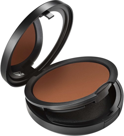 A compact makeup mirror with a bronze-colored powder inside. It has a black case and lid that opens.