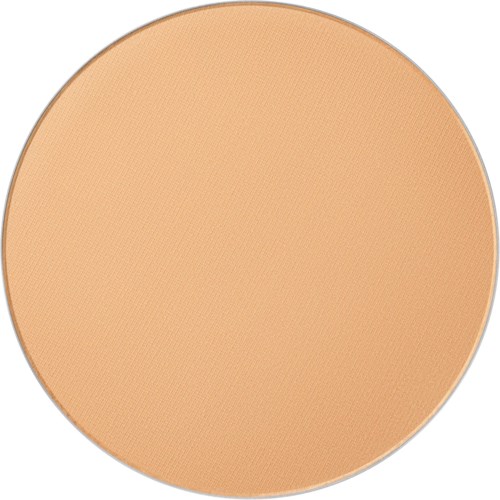Solid peach-colored circular makeup compact with a mirror inside.