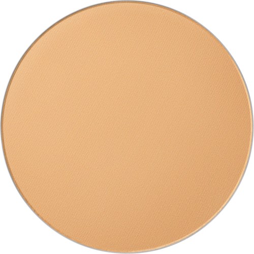 A round, beige makeup compact with a smooth surface and a thin silver border.