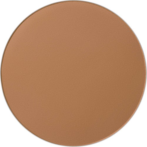 A large round makeup compact filled with brown powder or foundation.