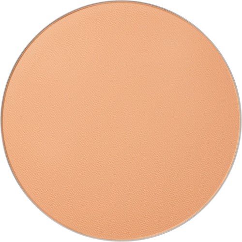 A large, flat, peach-colored round surface with a slightly textured appearance.