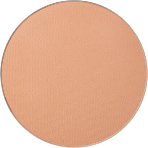A round, peach-colored makeup compact with a matte surface.