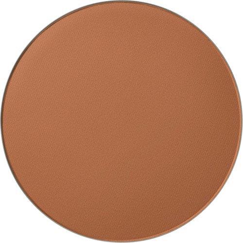 En rund bronzerkvadrat med ljusbrunt makeup i.