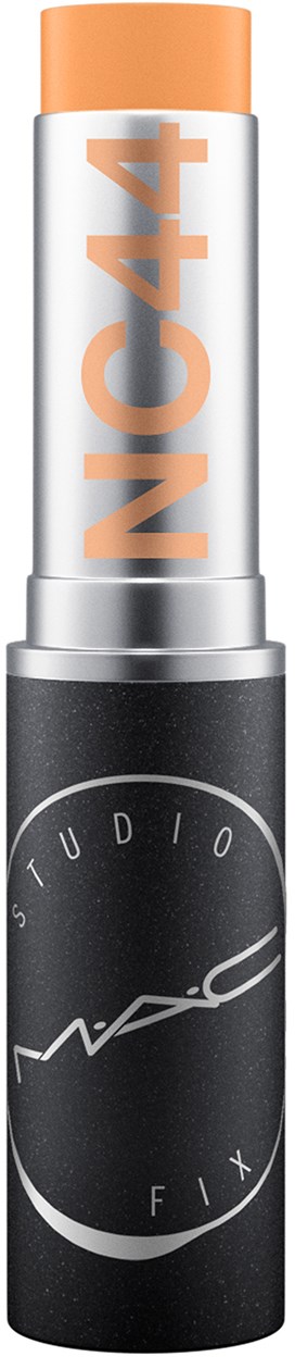Ein MAC Studio Fix-Stick in Hellbeige mit orangefarbener Beschriftung 'NC44', die heraussticht.