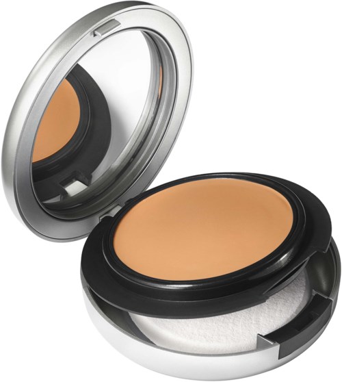 Compact makeup case with mirror open, containing beige-colored powder and a sponge applicator.