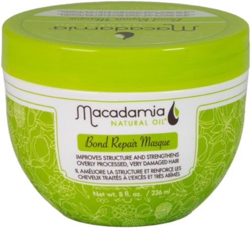 A green and white jar of Macadamia Bond Repair Masque for damaged hair.