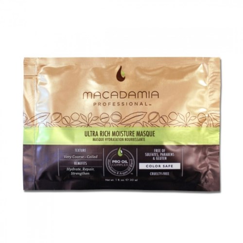 A gold and black packet of Macadamia Professional Ultra Rich Moisture Mask for hair care.
