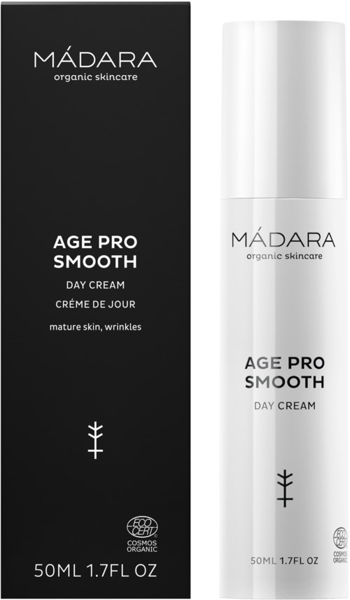 Een zwarte doos en een witte fles van Madara Age Pro Smooth Day Cream, voor rijpe huid en rimpels.