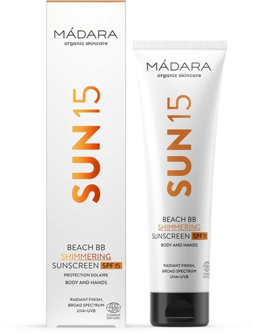 En tub och förpackning av Mádara ekologisk solskyddsmedel med SPF 15 för ansikte och kropp, betonar solskydd.